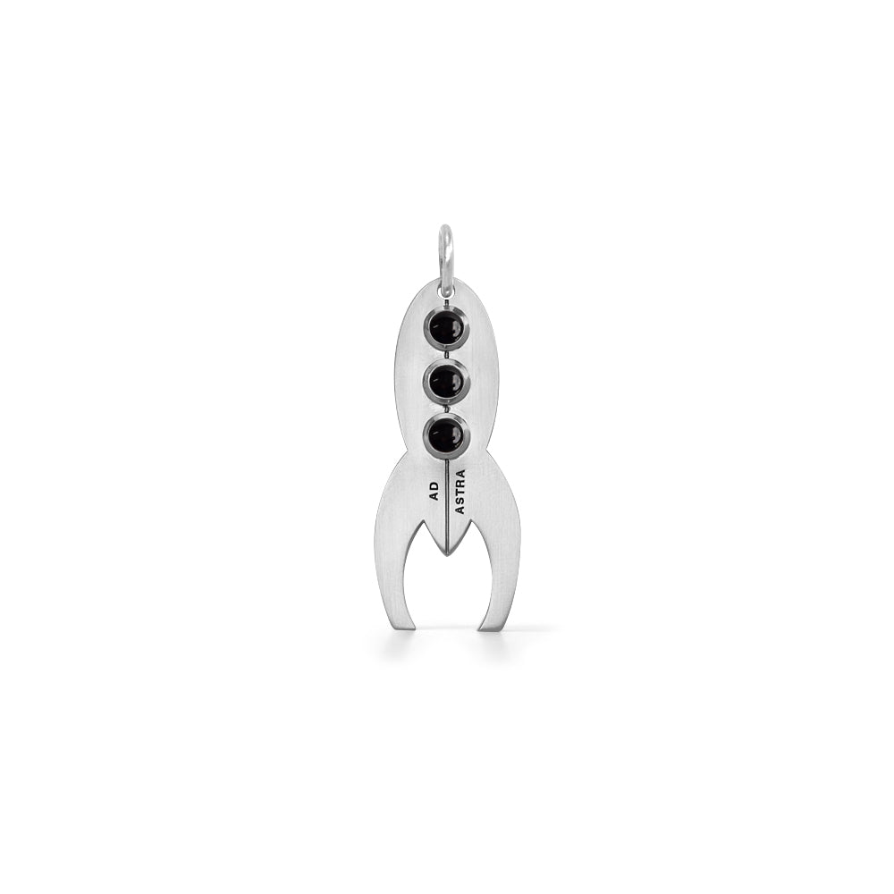 Silver rocket-shaped pendant with black gemstones as windows
