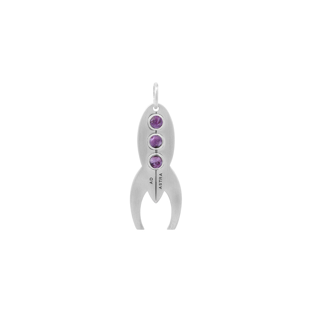 Silver pendant shaped like a spaceship with purple gemstones