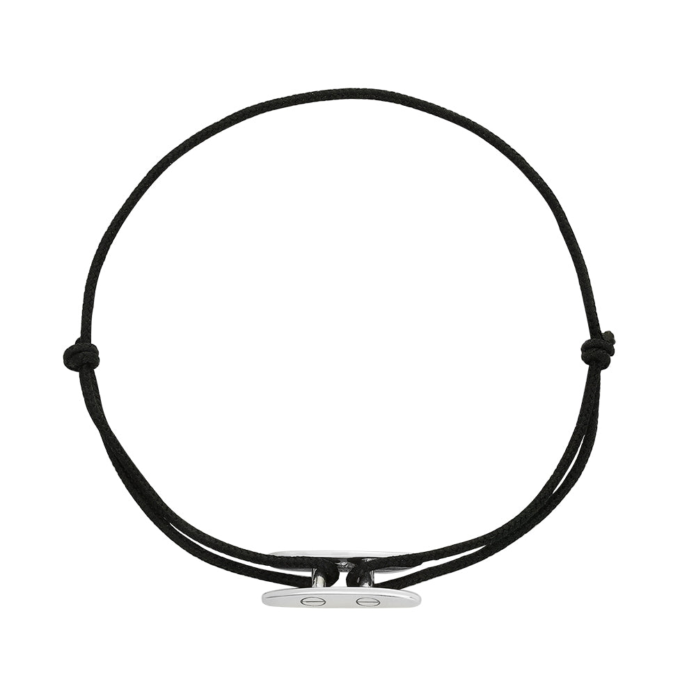 Black cord bracelet with a silver nautical charm side view