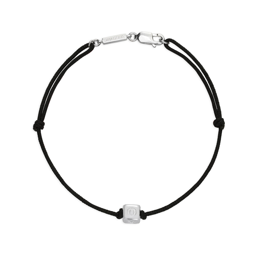 Black cord bracelet with silver clasp and square charm showing the letter O of Love.