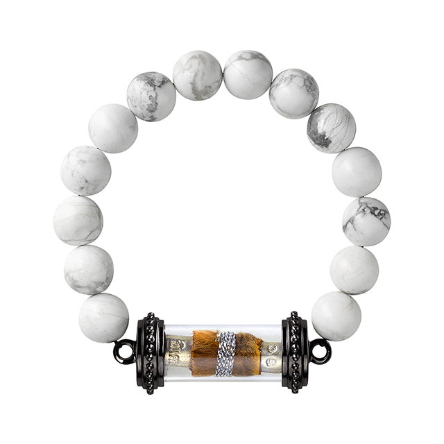 Howlite beaded bracelet with a Thai amulet
